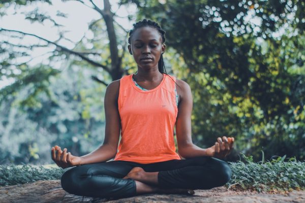 Woman Meditating in the Outdoors